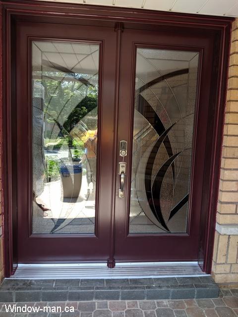 Double exterior doors. Front entry steel insulated. Burgundy color. Very modern lovely stained glass. One deadbolt and handle